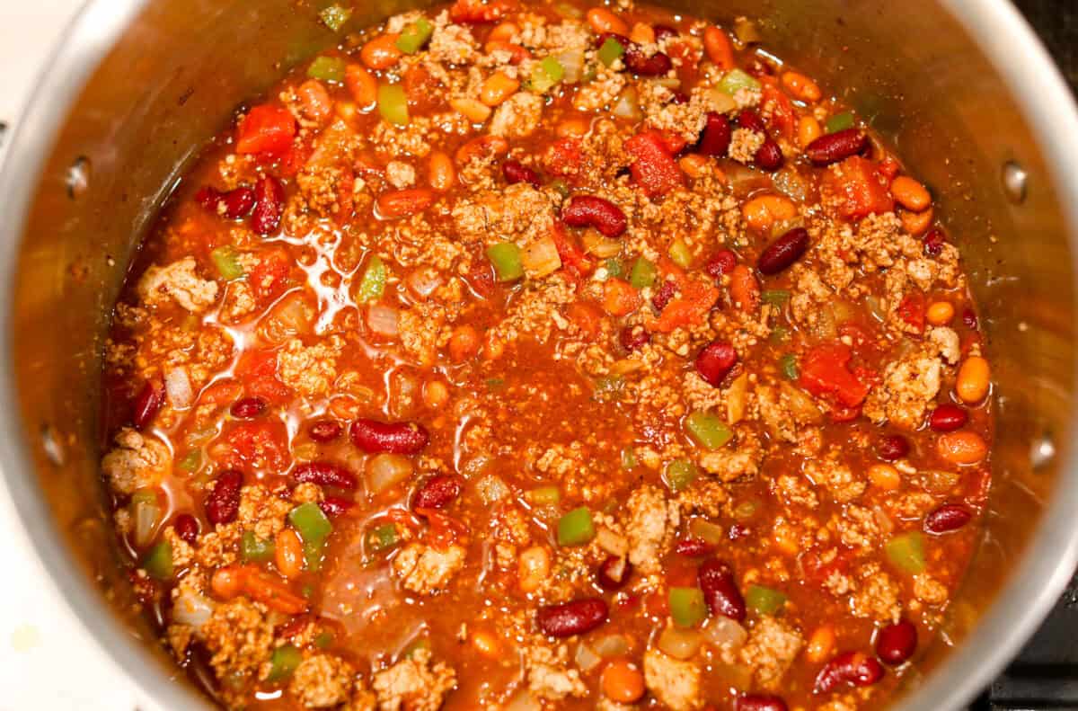 Overhead shot of all ingredients simmering in a pot. 