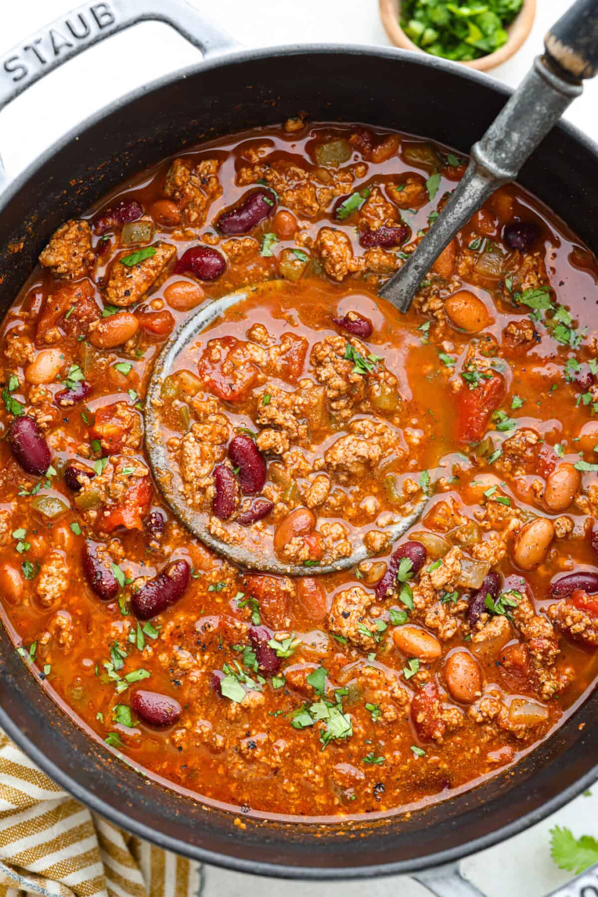 Overhead shot of turkey chili in a pot. 