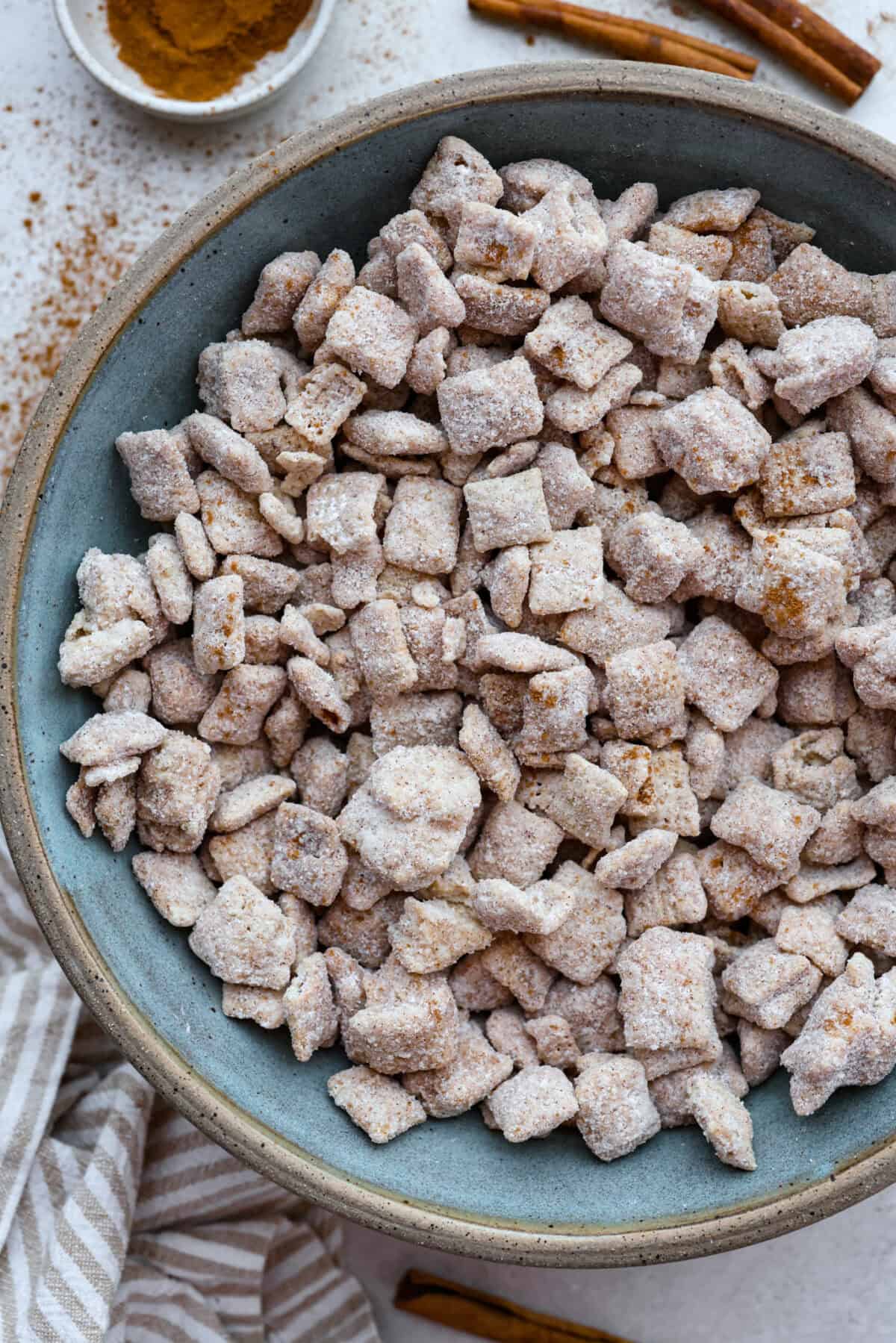 Overhead shot of a large bowl of churro Chex mix. 